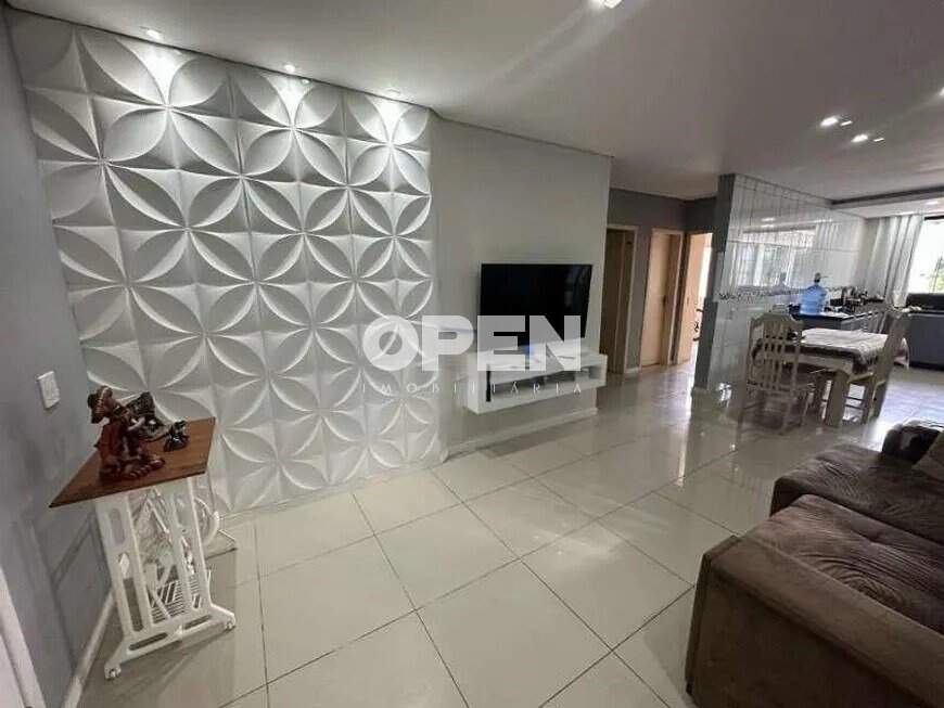 Casa com 90m², 3 dormitórios, 1 suíte, 2 vagas no bairro Fátima em Canoas para Comprar