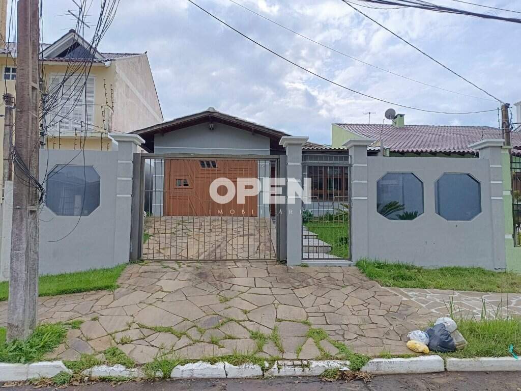 Casa com 100m², 3 dormitórios, 1 suíte, 2 vagas no bairro Igara em Canoas para Comprar