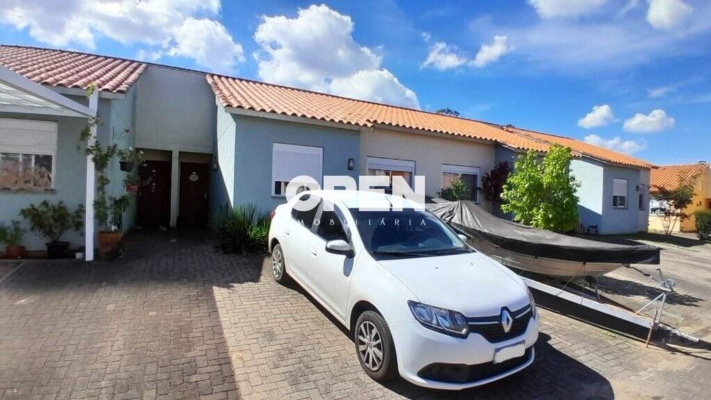 Casa em Condomínio  com 85m², 2 dormitórios, 2 vagas, Vila Florença em Canoas para Comprar