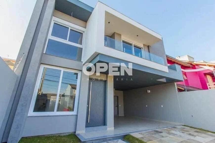 Sobrado com 220m², 3 dormitórios, 3 suítes, 2 vagas no bairro Moinhos de Vento em Canoas para Comprar