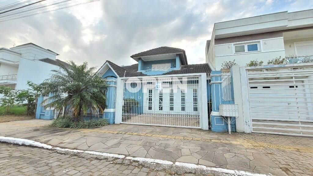 Casa com 150m², 4 dormitórios, 2 suítes, 4 vagas no bairro Marechal Rondon em Canoas para Comprar