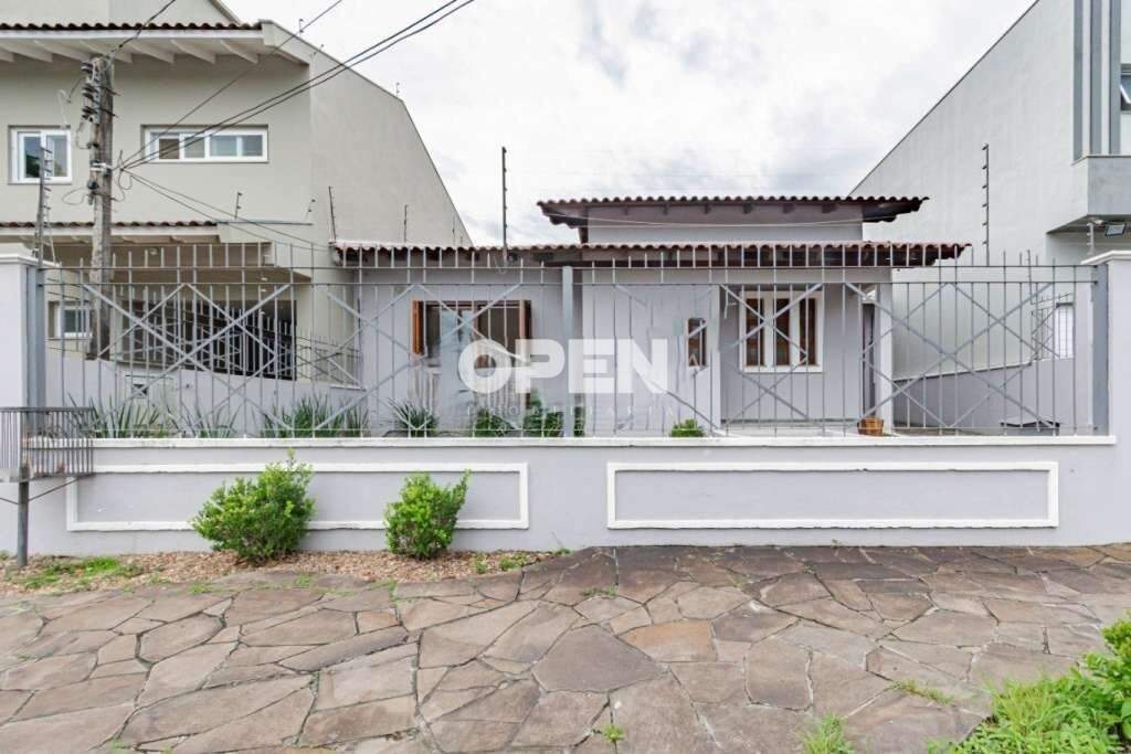 Casa com 118m², 3 dormitórios, 1 suíte, 5 vagas no bairro Estância Velha em Canoas para Comprar