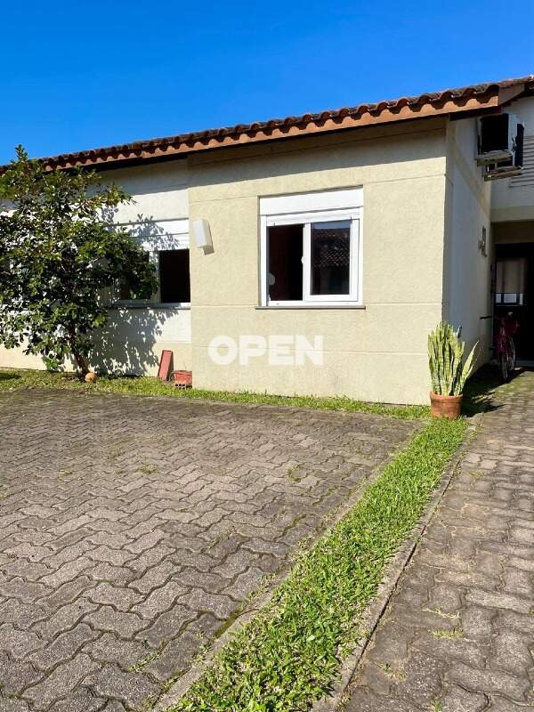 Casa em Condomínio  com 80m², 2 dormitórios, 2 vagas, Residencial Villa di Italia em Canoas para Comprar