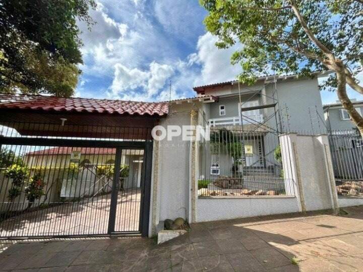 Sobrado com 464m², 6 dormitórios, 4 suítes, 2 vagas no bairro Igara em Canoas para Comprar