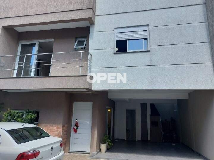 Casa em Condomínio  com 108m², 3 dormitórios, 1 suíte, 2 vagas no bairro Niterói em Canoas para Comprar