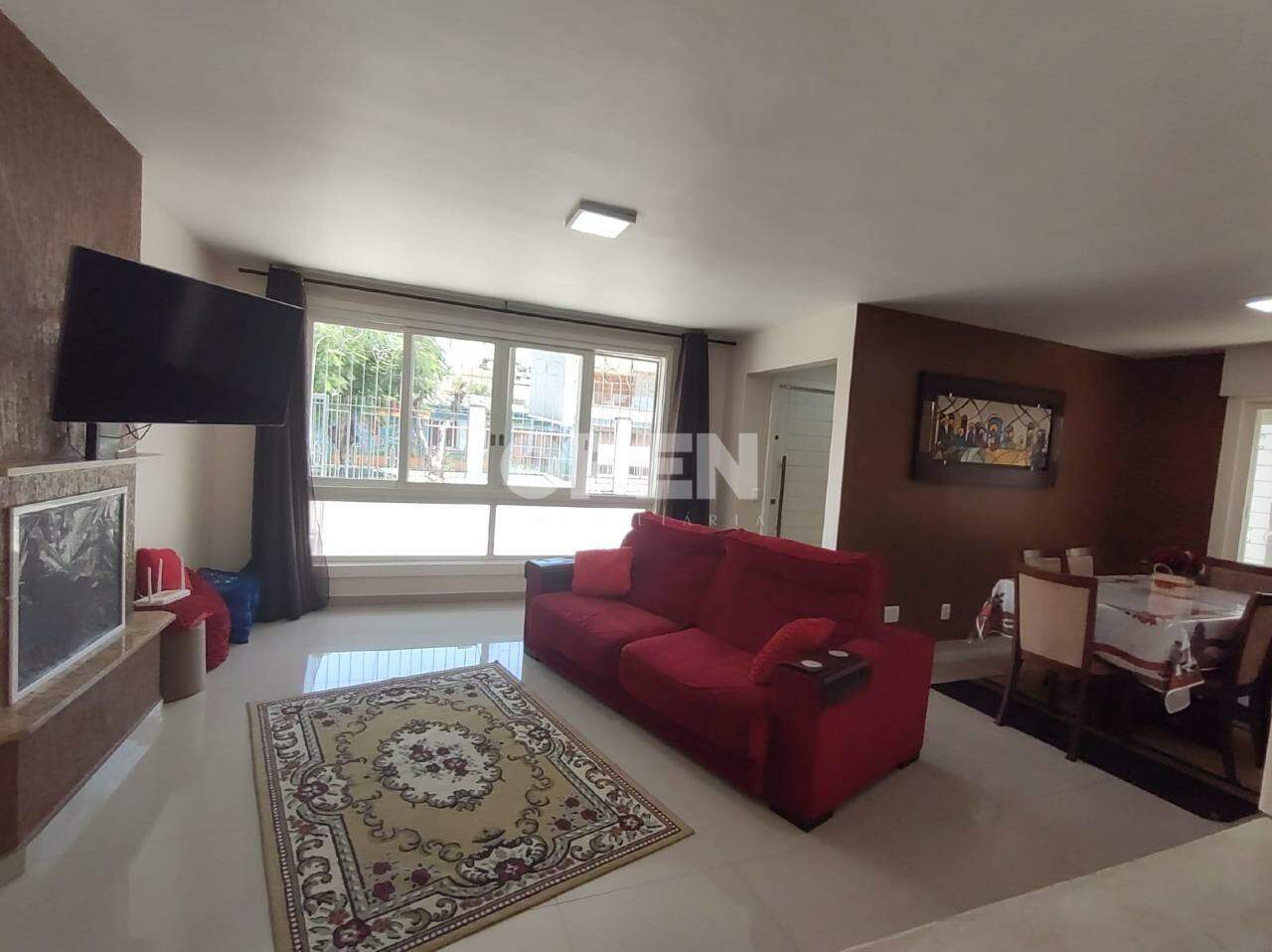 Casa com 160m², 3 dormitórios, 1 suíte, 3 vagas no bairro Marechal Rondon em Canoas para Comprar