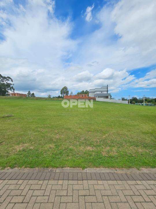 Lote em condomínio com 390m², Reservas do Lago em Nova Santa Rita para Comprar