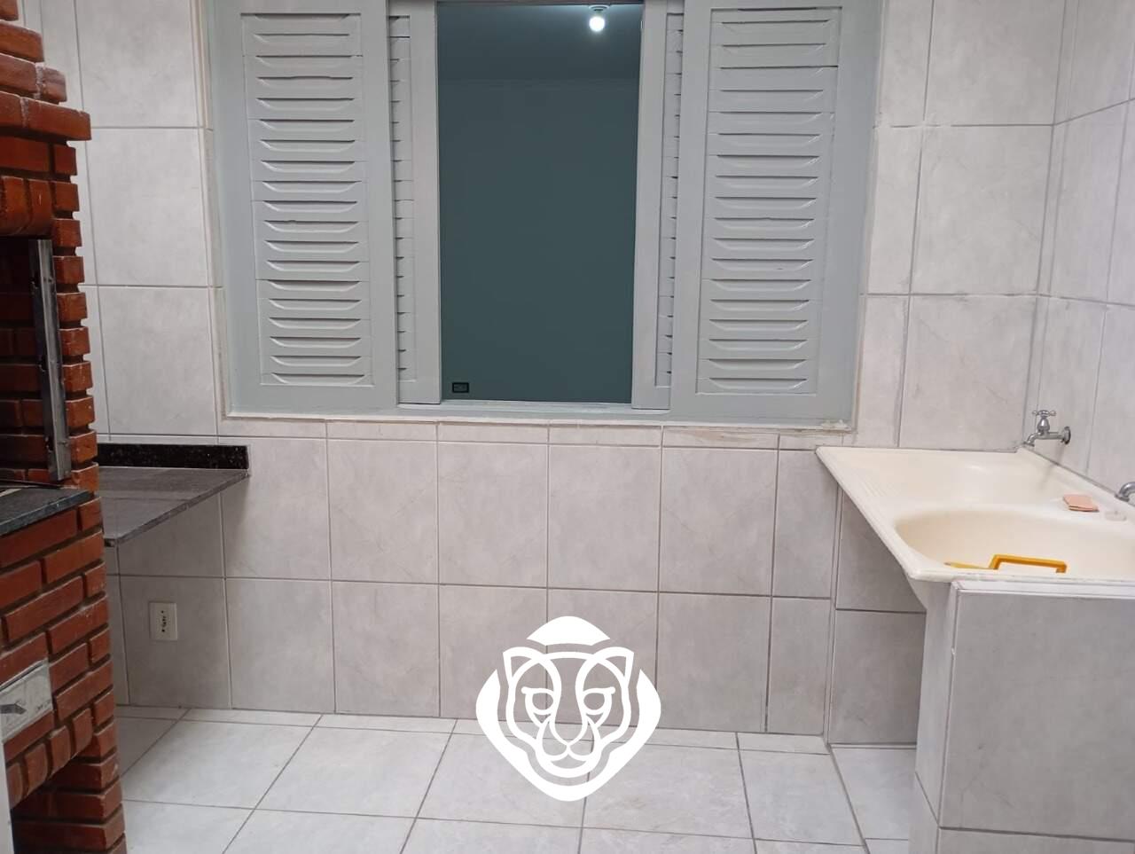 Lavanderia e churrasqueira