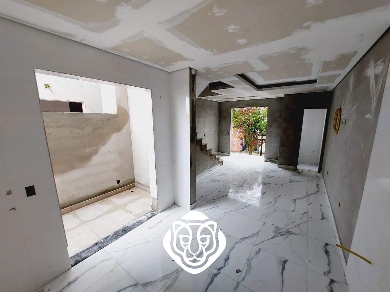 Sala, lavabo e cozinha