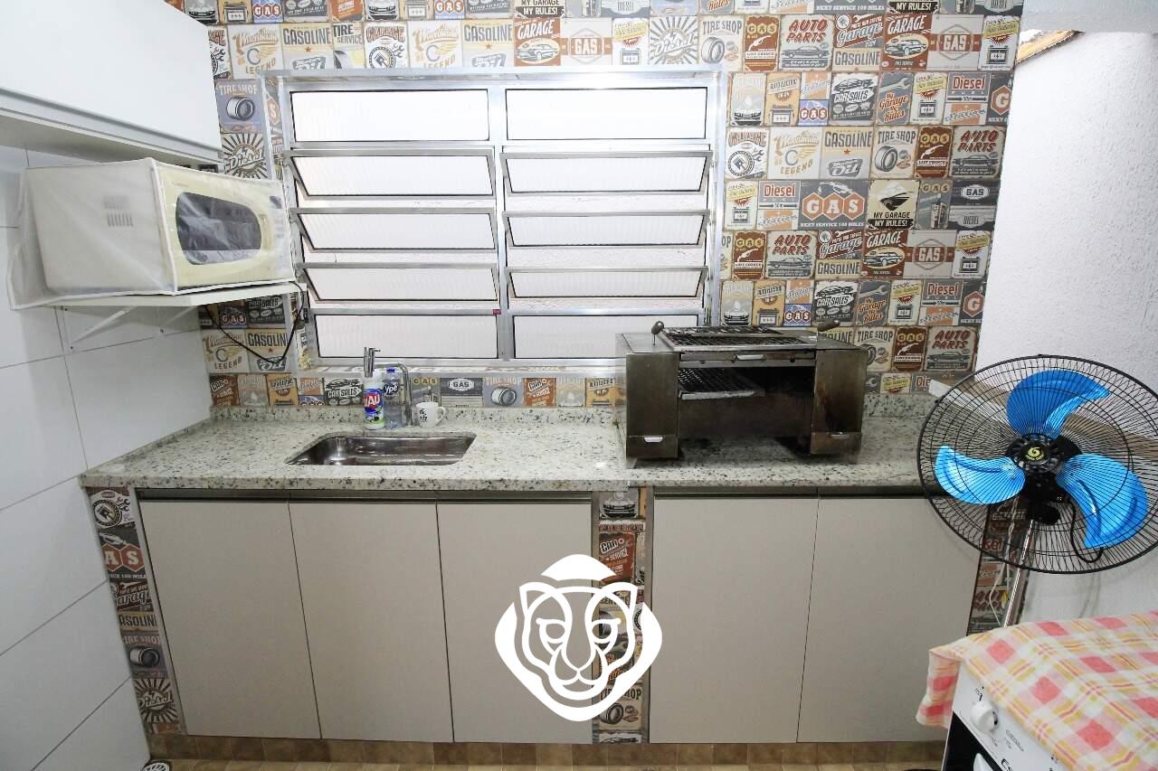 Área de serviço com lavabo