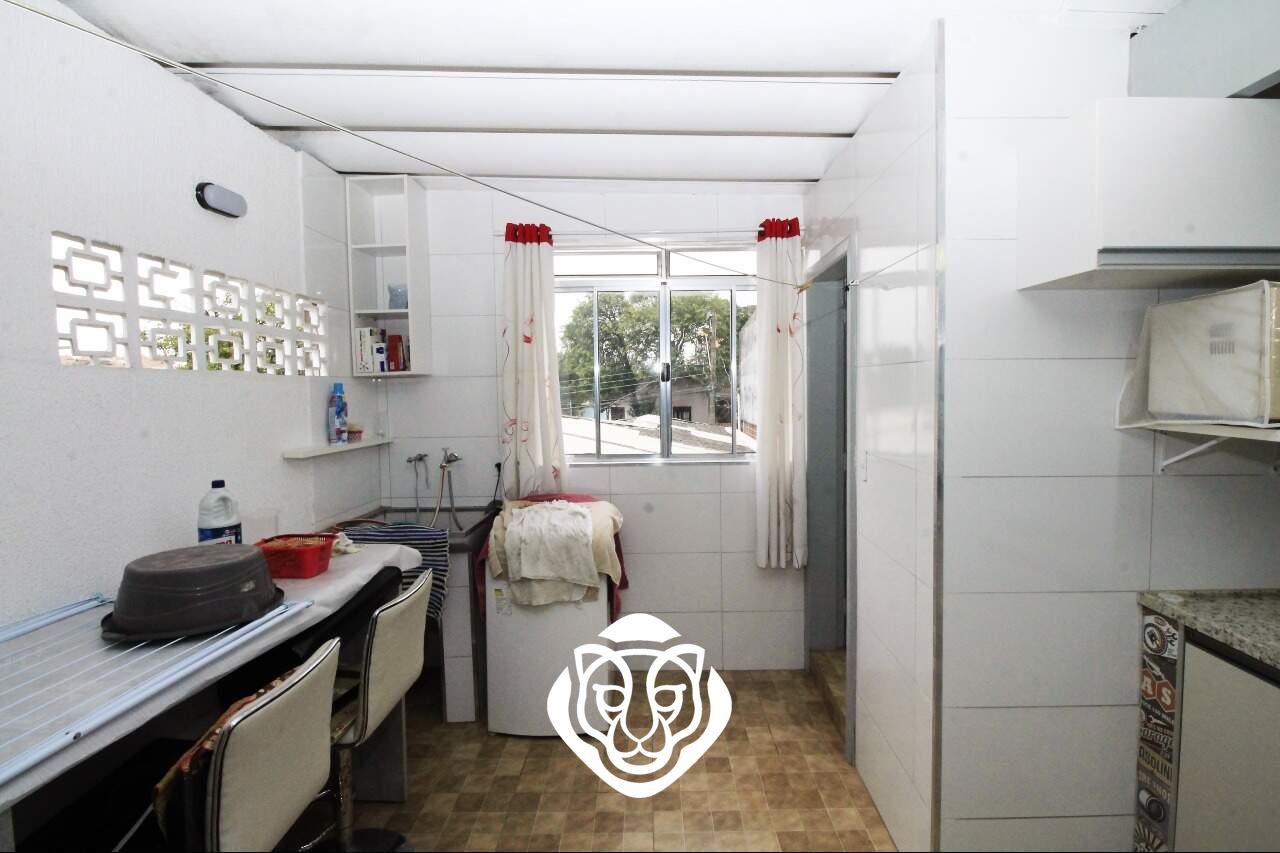 Área de serviço com lavabo