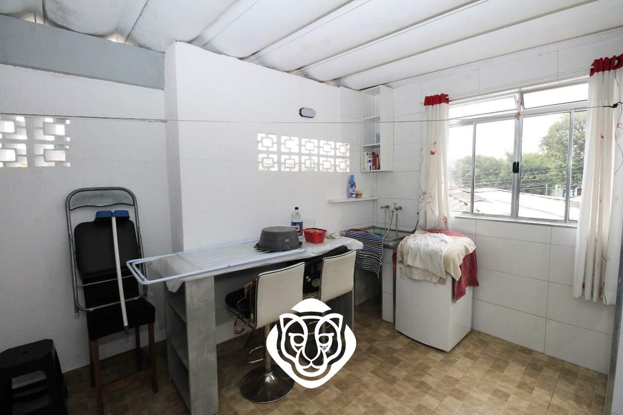 Área de serviço com lavabo