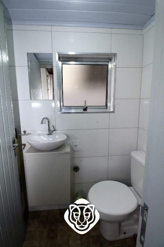 Área de serviço com lavabo