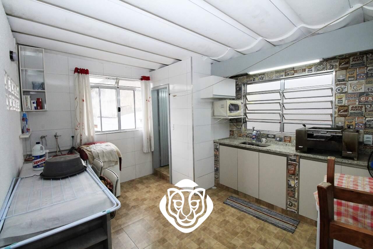 Área de serviço com lavabo