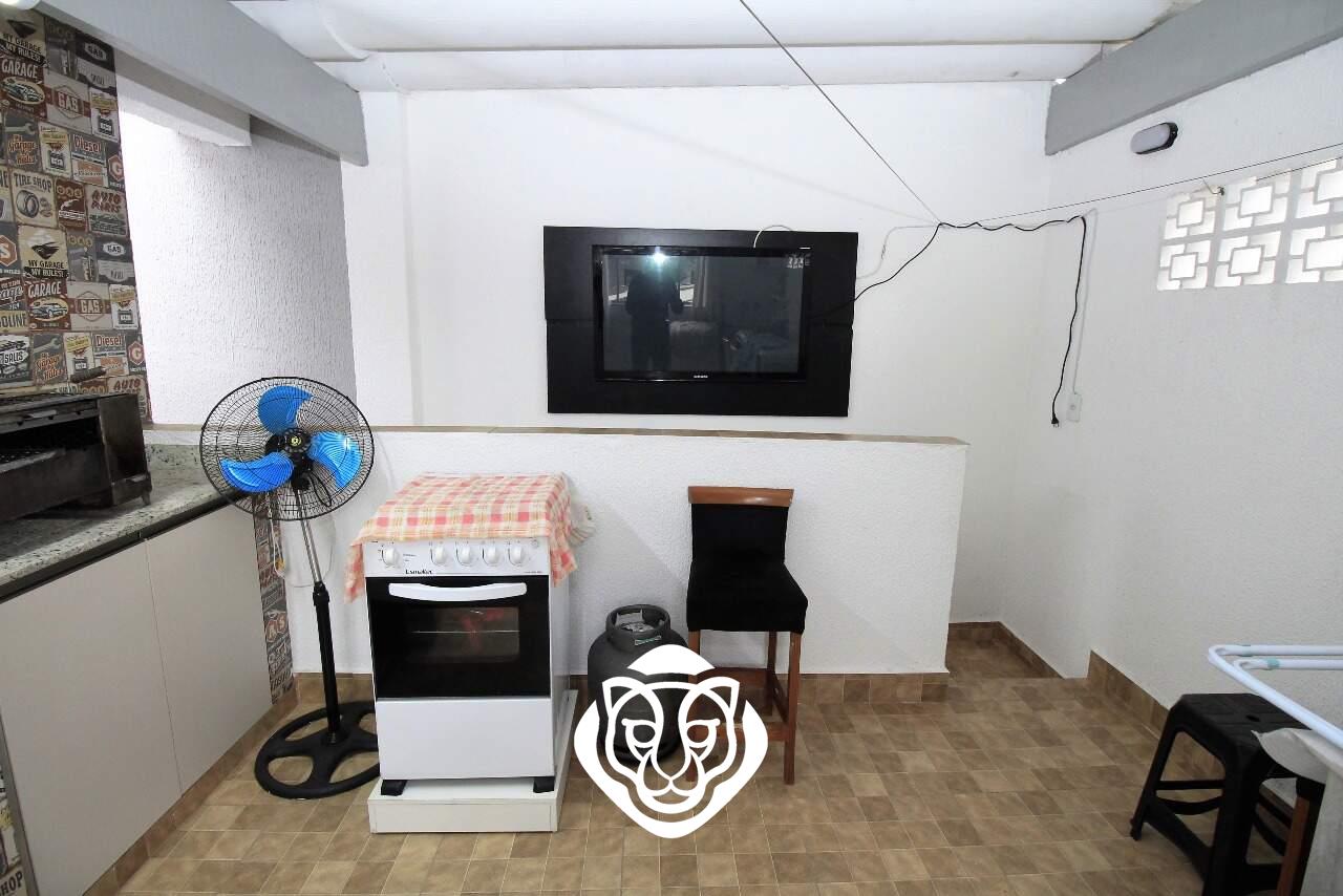 Área de serviço com lavabo