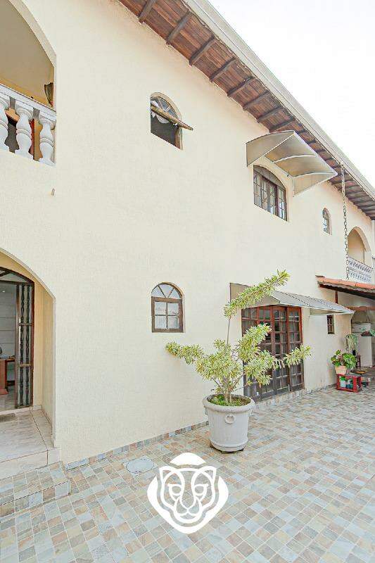 Fachada casa fundos 
