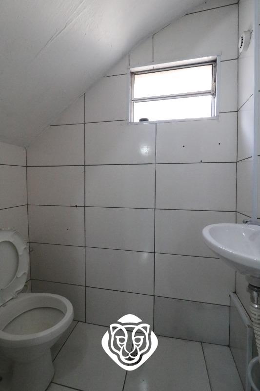 Salão subsolo/Banheiro III