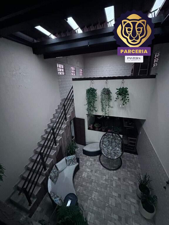 Quintal e acesso churrasqueira