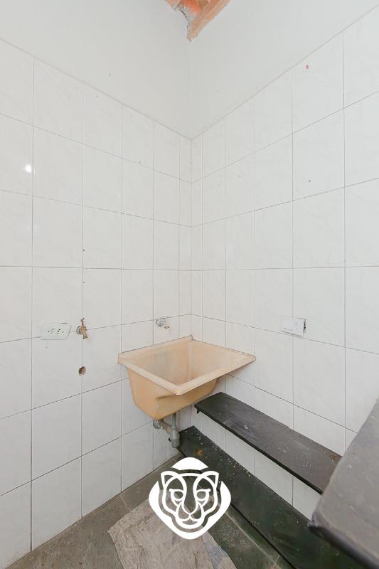 Área de serviço casa fundos 