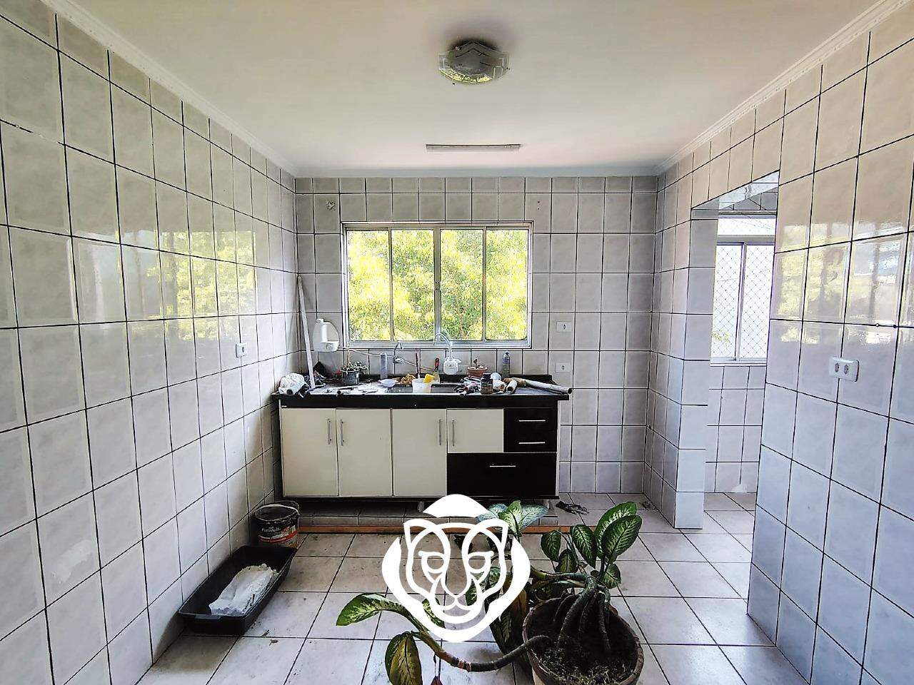 Apartamento sobre loja cozinha
