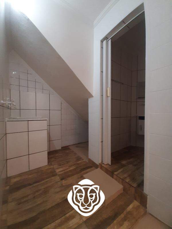 Hall lavanderia e banheiro