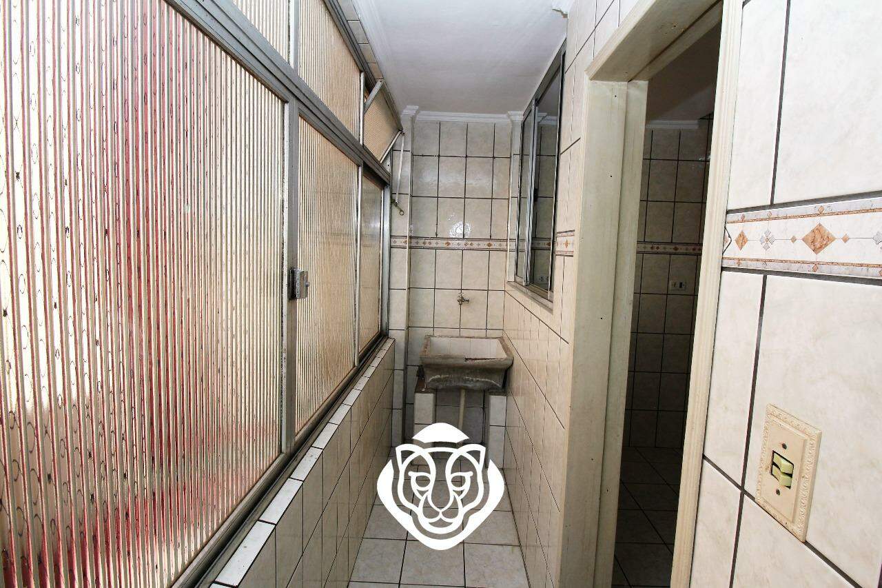 Área de serviço com banheiro