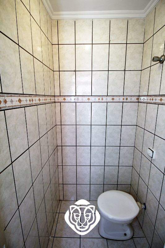 Área de serviço com banheiro