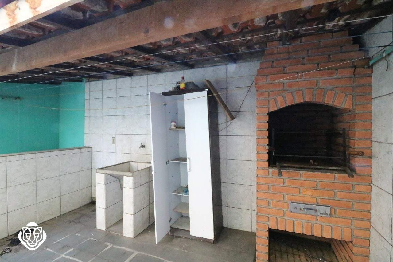 Área de serviço e churrasqueira