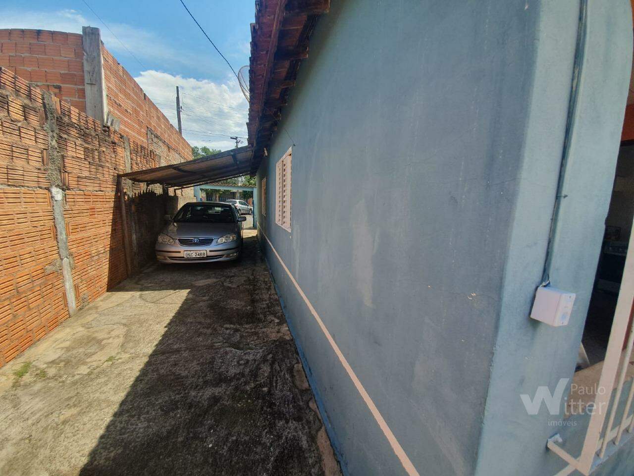 Casa à venda no Jardim Planalto: lateral casa frente