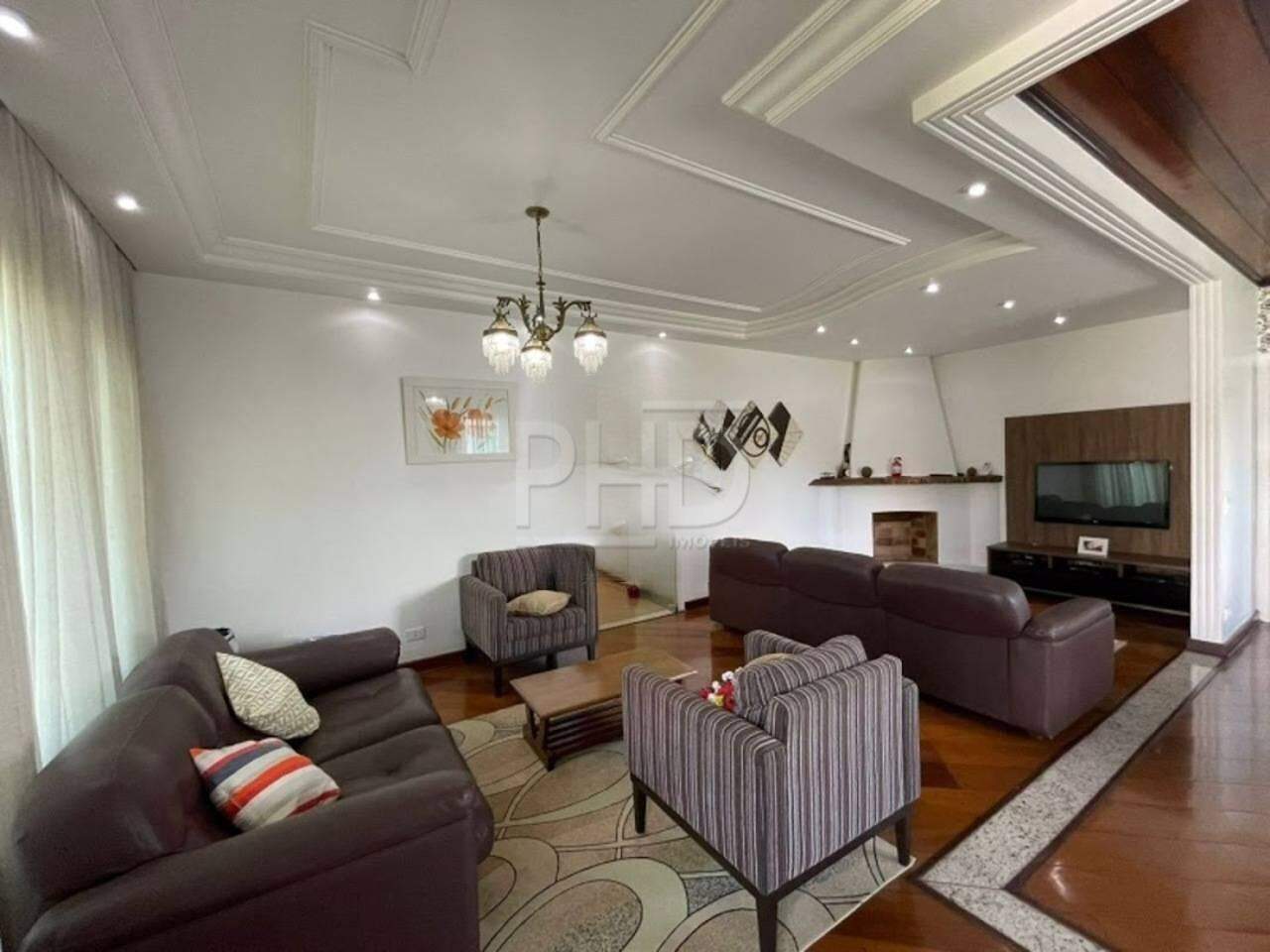 Casa à venda com 4 quartos, 297m² - Foto 1