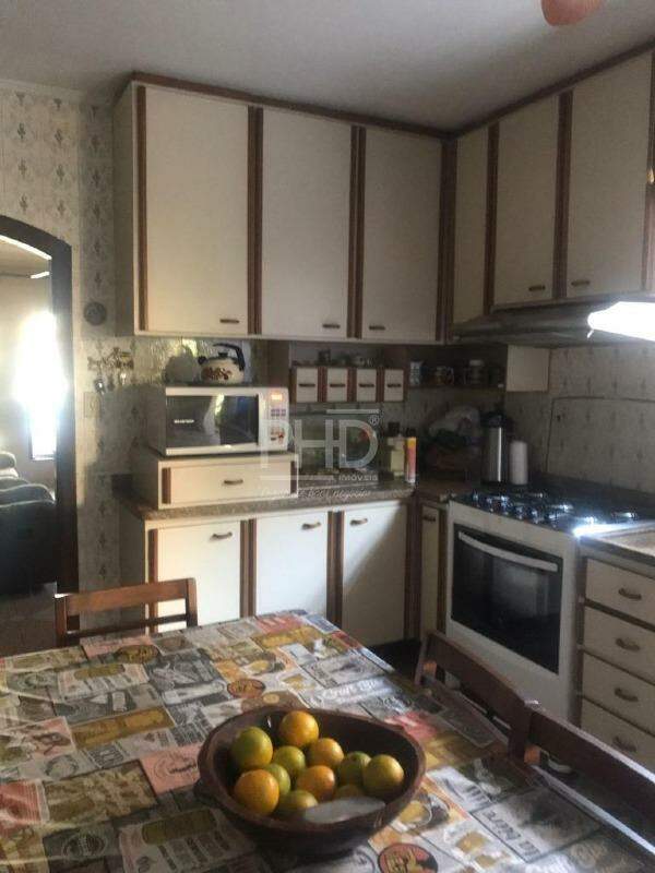 Sobrado à venda com 4 quartos, 120m² - Foto 1