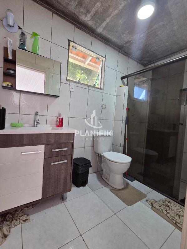 Foto com Locação Casa 1 - Banheiro Social