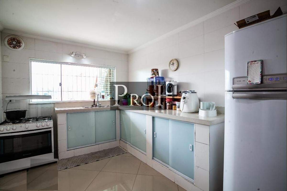 Casa à venda com 4 quartos, 222m² - Foto 7