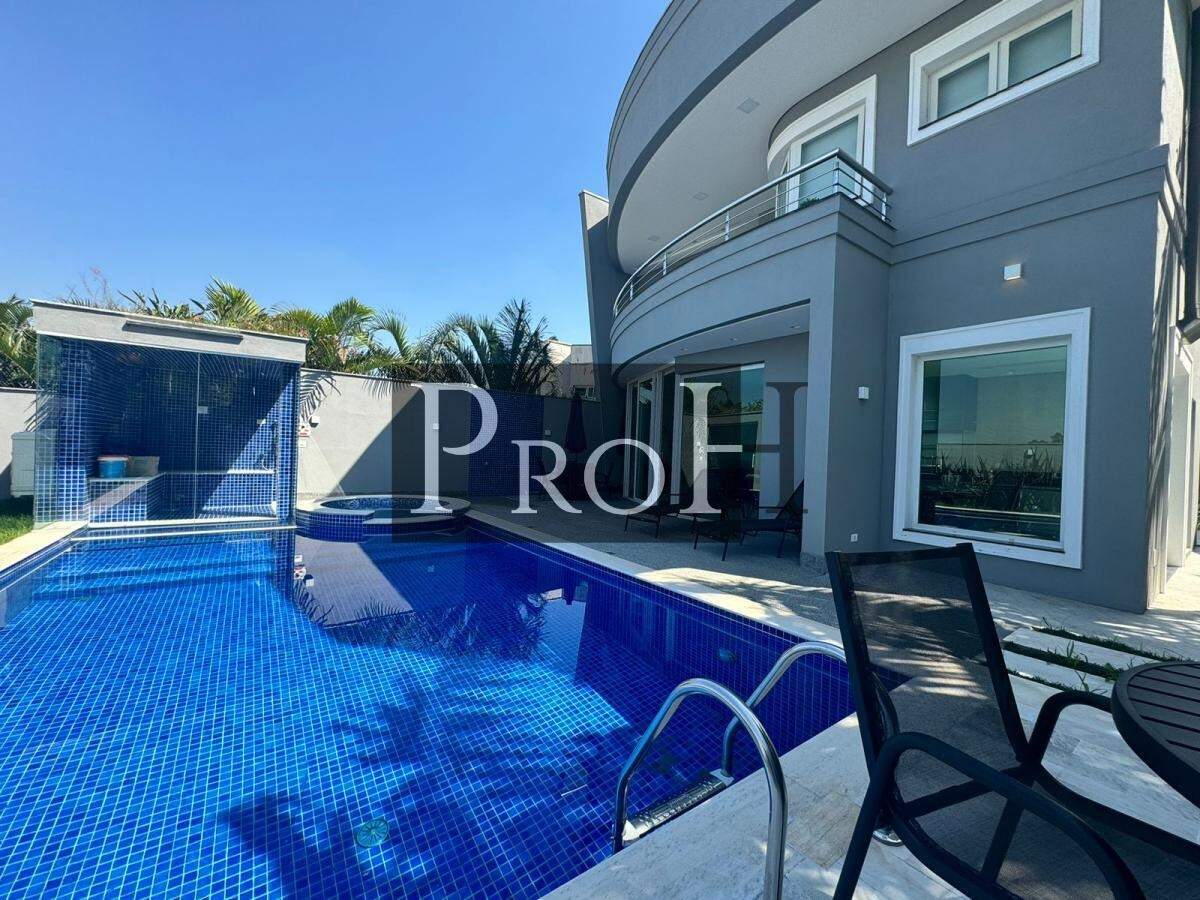 Casa de Condomínio à venda com 4 quartos, 548m² - Foto 4
