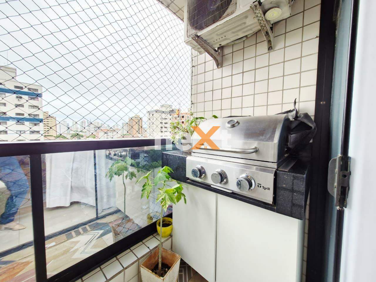 Apartamento à venda no Embaré: VARANDA COM CHURRASQUEIRA