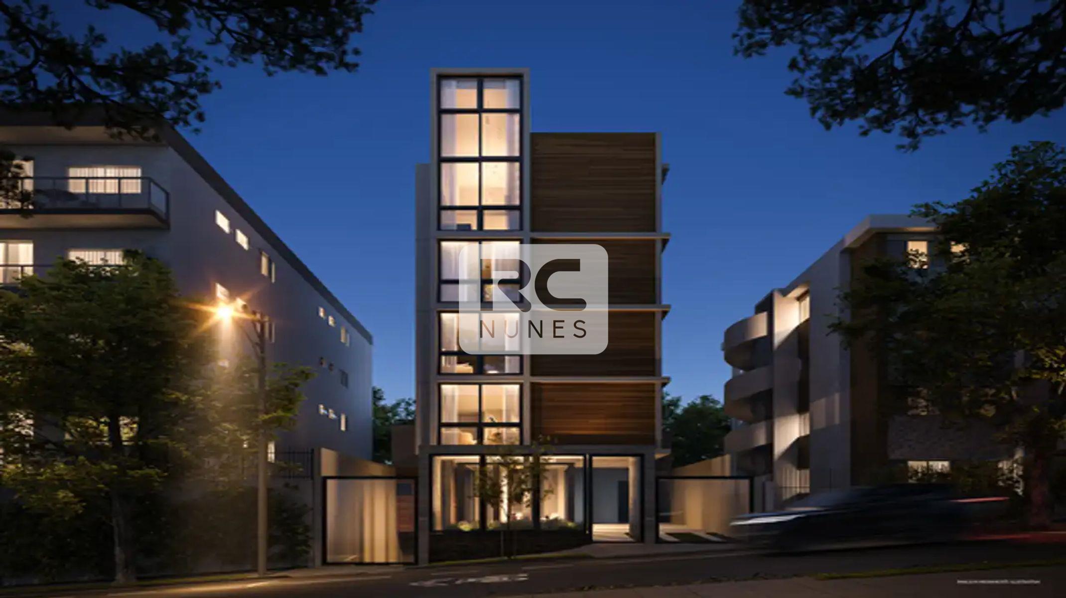 Apartamento à venda no Serra: Fachada noturna