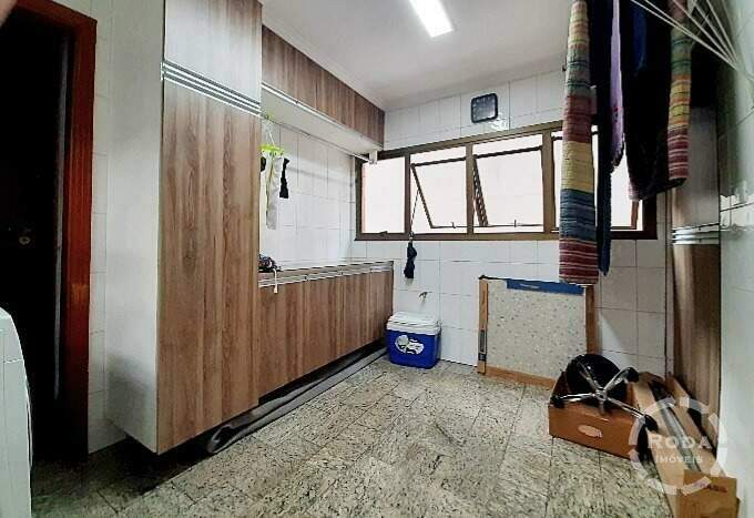 Apartamento à venda no Embaré: área de serviço com planejados