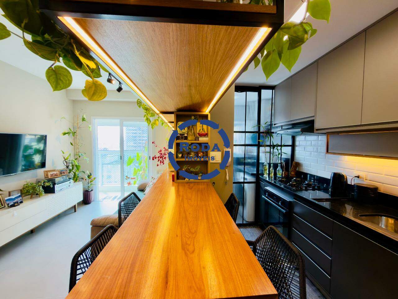 Apartamento à venda no Gonzaga: sala 2 ambientes integrada a cozinha 