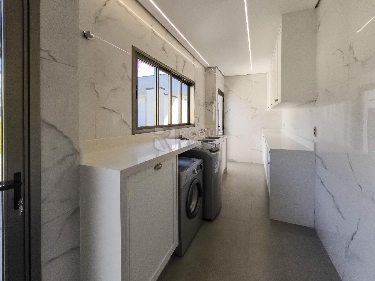 Casa em condomínio à venda no bairro Portal das Rosas: LAVANDERIA