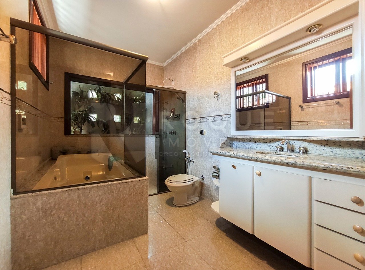 Casa em condomínio à venda no bairro Jardim Aquárius: 