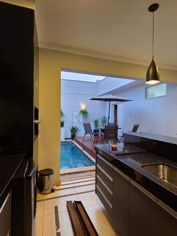 Casa em condomínio à venda no bairro Parque Residencial Roland: Área gourmet
