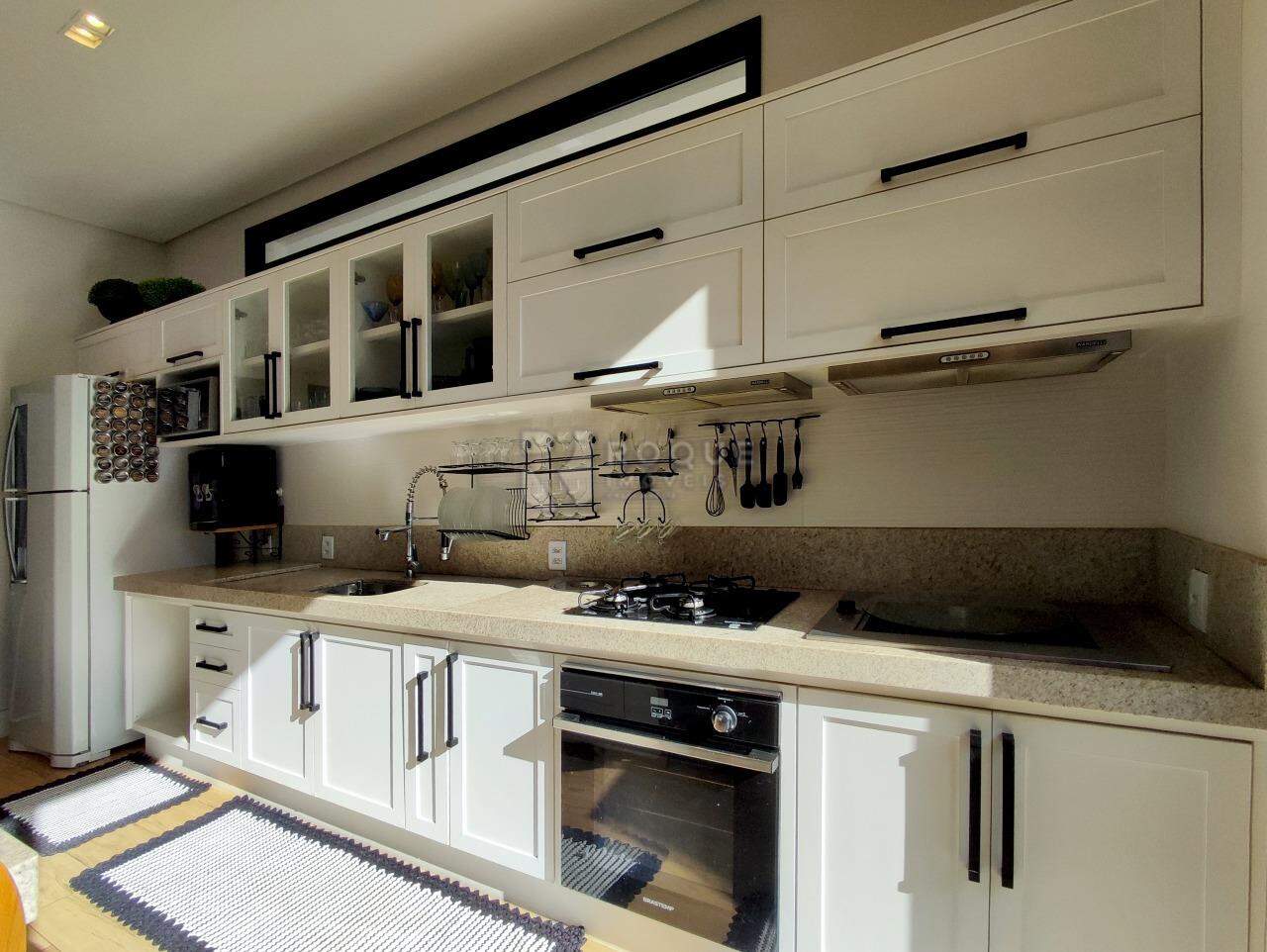 Casa em condomínio à venda no bairro Jardim Florença: COZINHA