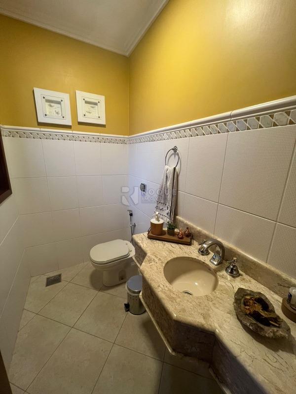 Casa em condomínio à venda no bairro Jardim Itapoã: lavabo