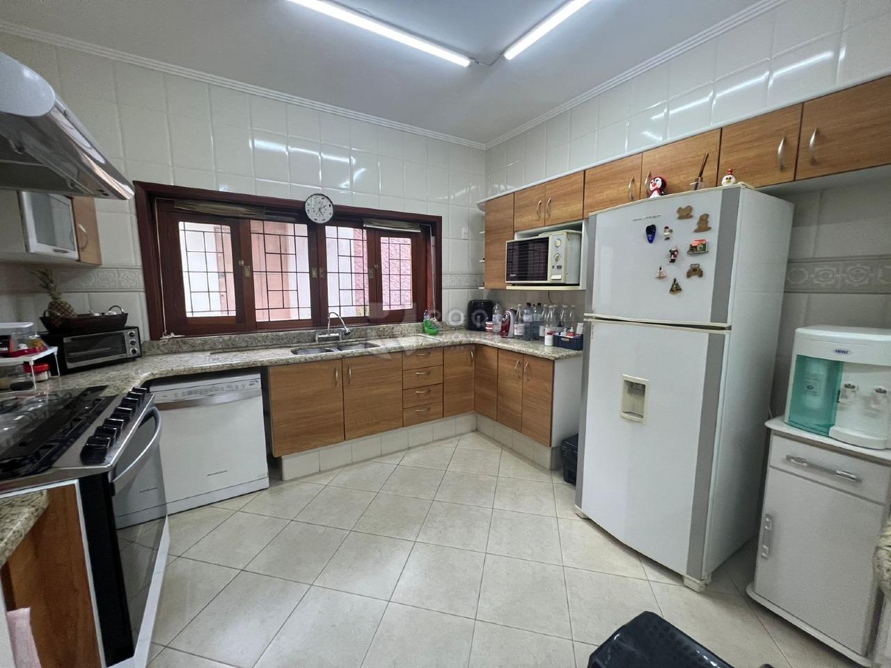 Casa em condomínio à venda no bairro Jardim Itapoã: COZINHA