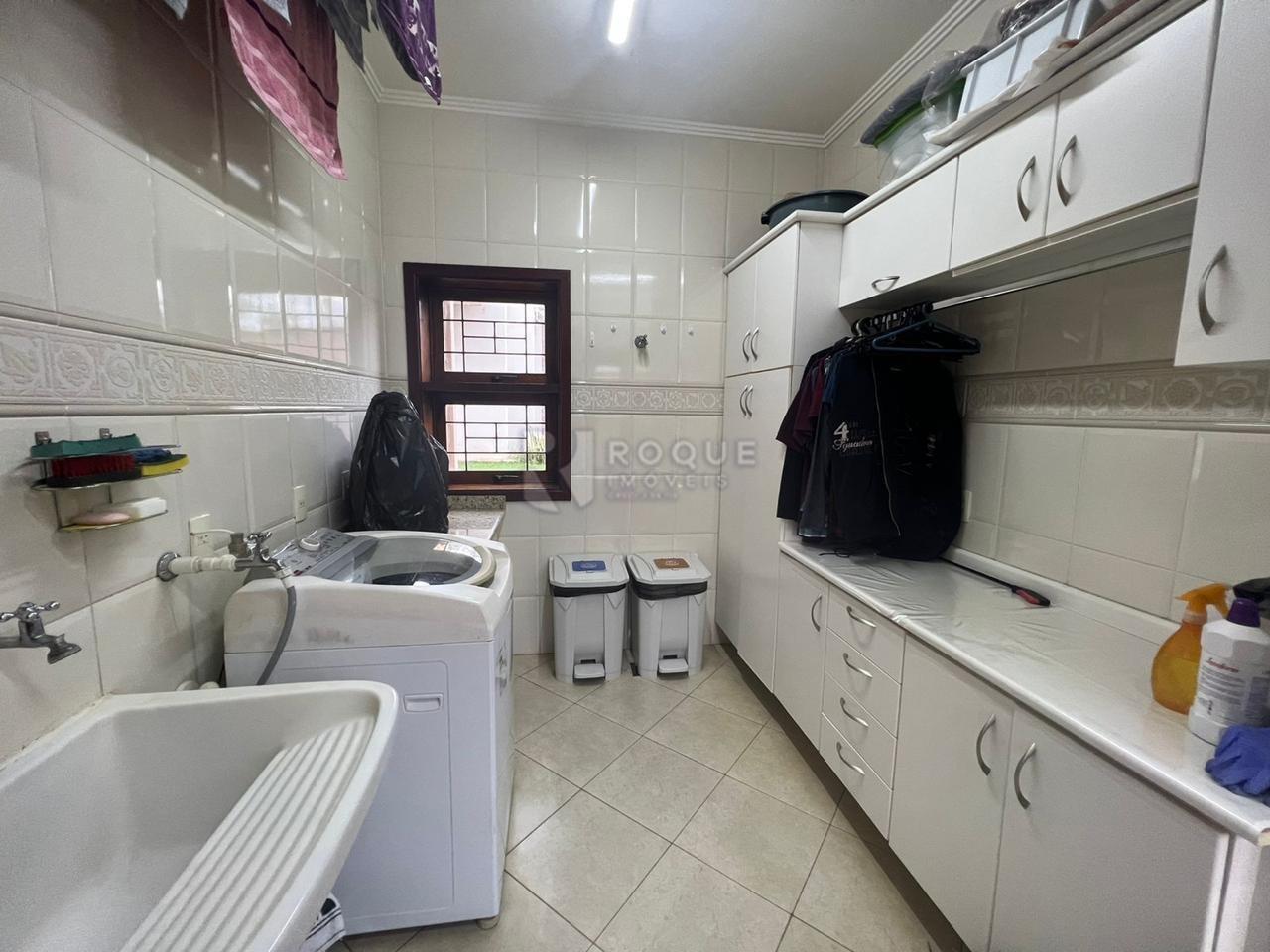 Casa em condomínio à venda no bairro Jardim Itapoã: ÁREA SERVIÇO