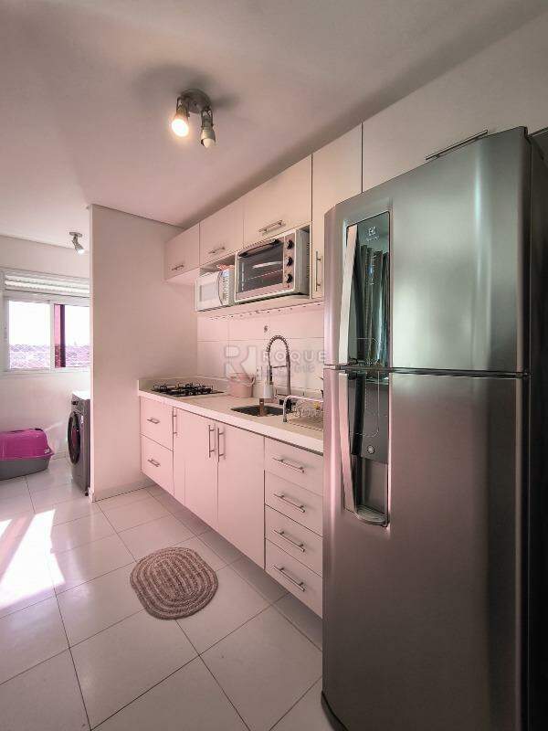 Apartamento à venda no bairro Desmembramento Oscar Antonio Breda: COZINHA