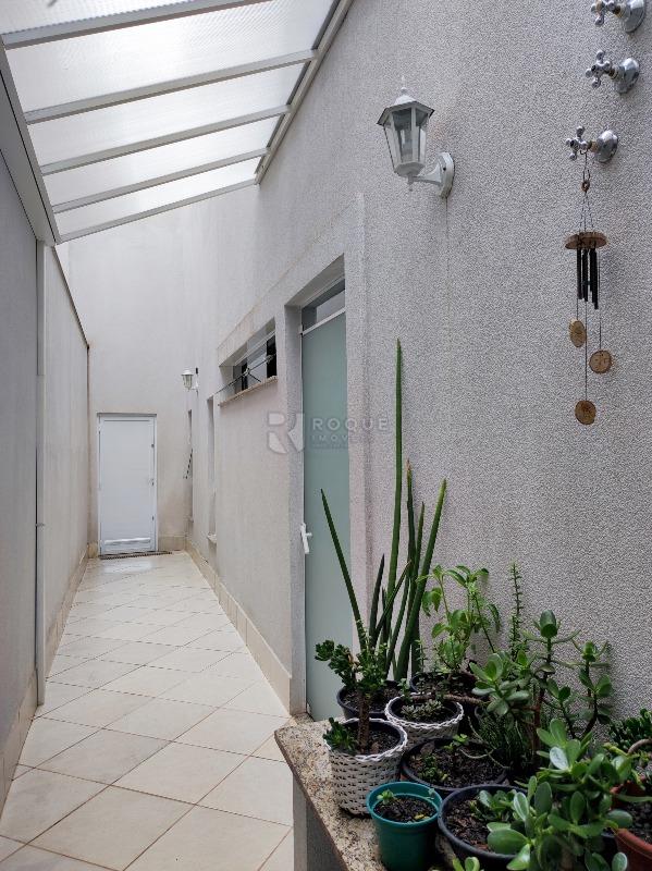 Casa em condomínio à venda no bairro Jardim Terras de Santa Elisa: LATERAL EXTERNA