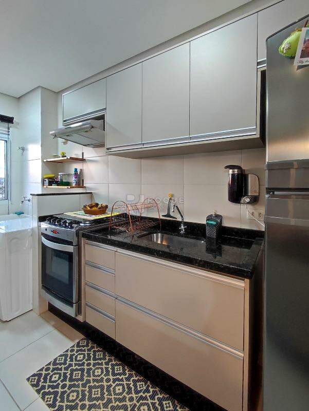 Apartamento à venda no bairro Chácaras Antonieta: COZINHA