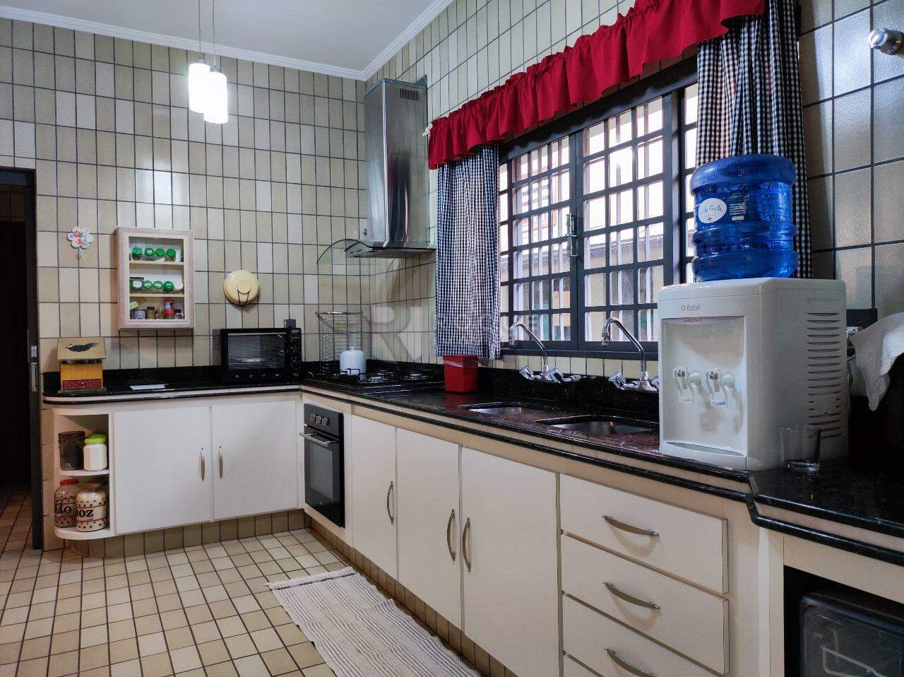 Casa em condomínio à venda no bairro Jardim Florença: COZINHA
