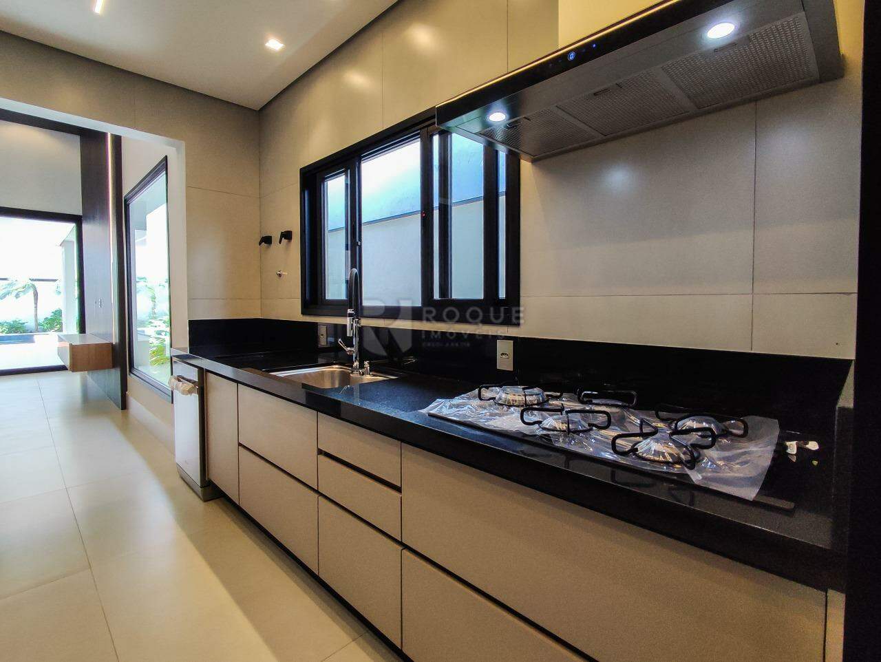 Casa em condomínio à venda no bairro Residencial Greville: COZINHA